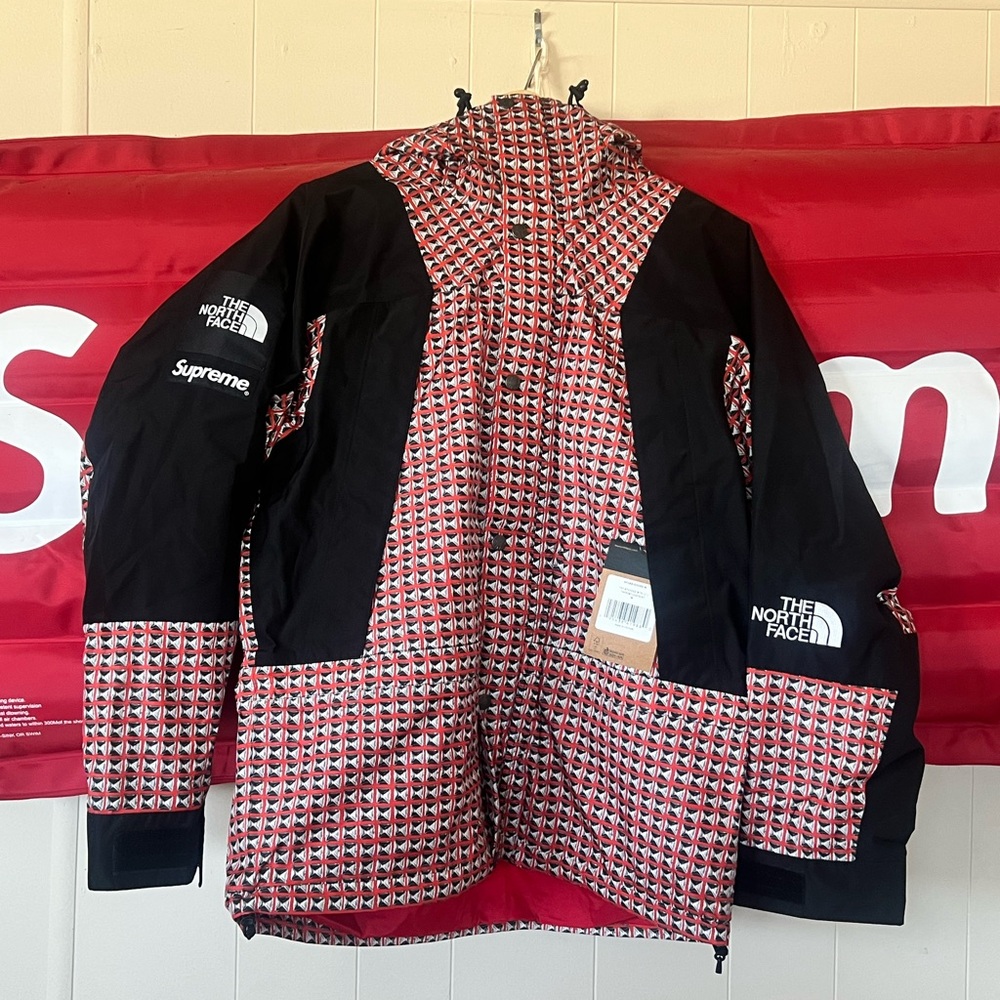 The North Face Red and Black Patterned Jacket